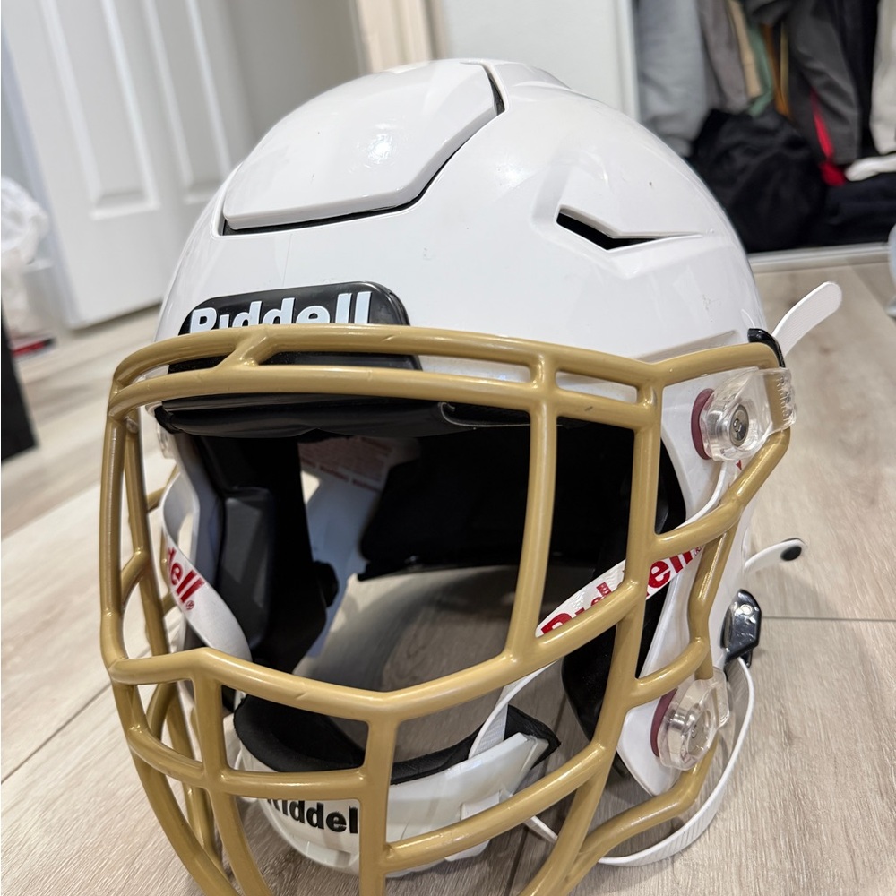 Riddell White Football Helmet with Gold Facemask